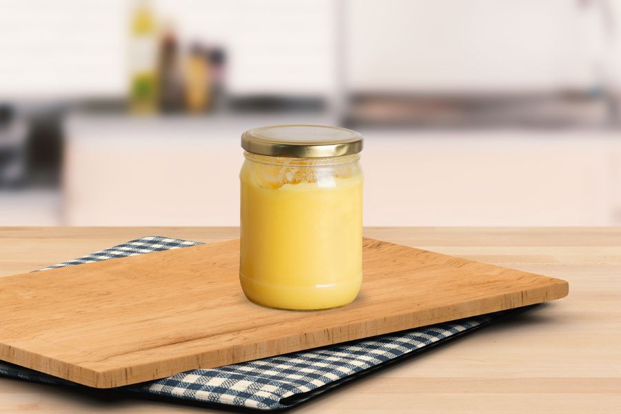 Jar of cannabutter on kitchen counter